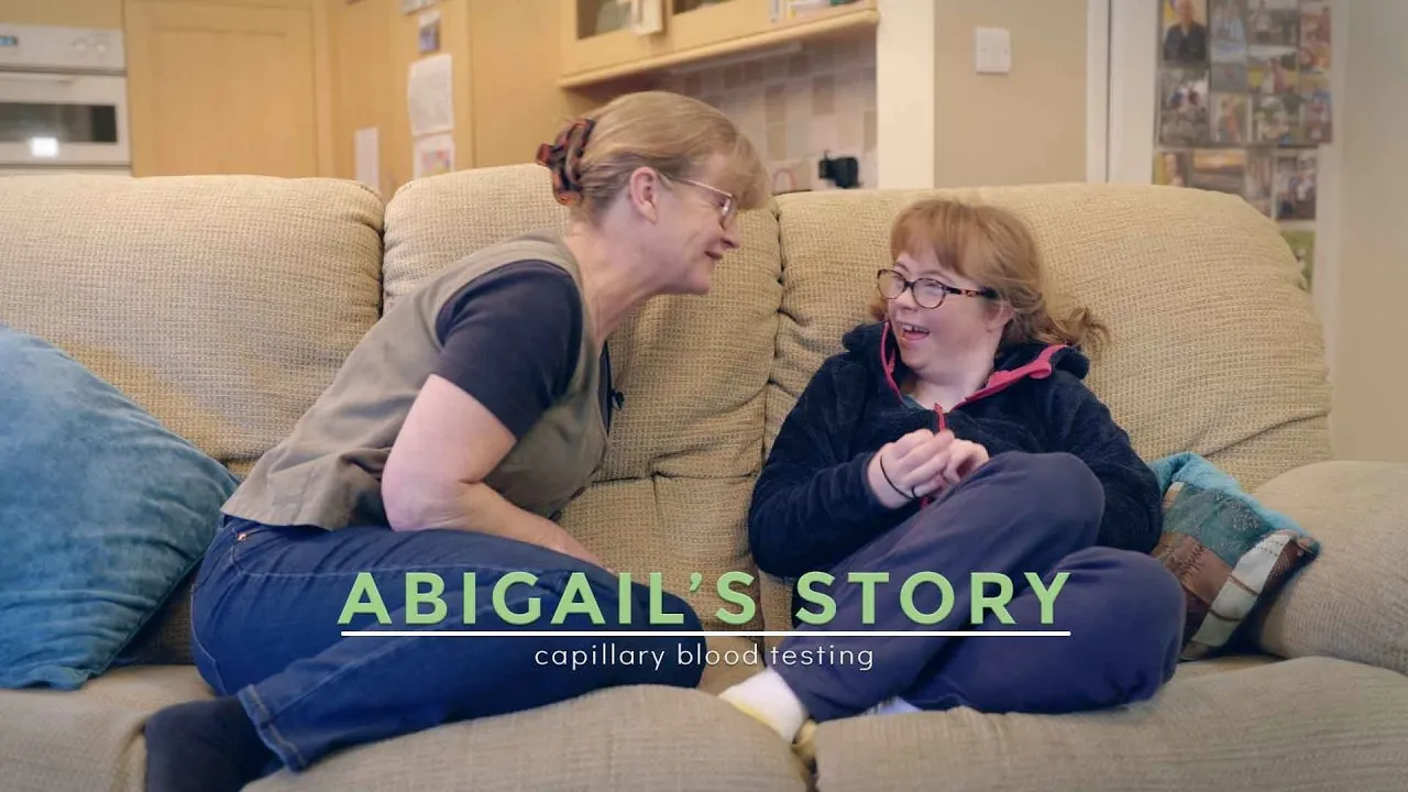 Abi and her mother Heather at home, from University Hospitals of Morecambe Bay NHS Foundation Trust’s film about her blood tests